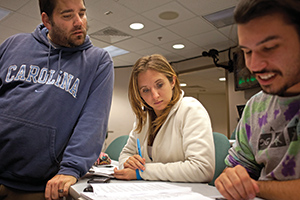 Trey Adcock speaks with students in the undergraduate Cherokee language class.