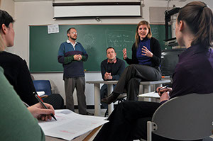 Royster fellows teaching in a classroom